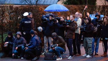 Media gather in front of the house believed to belong to the parents of Andreas Lubitz on Thursday.