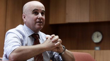 Education Minister Adrian Piccoli has been forced to defend Education Department's IT system.