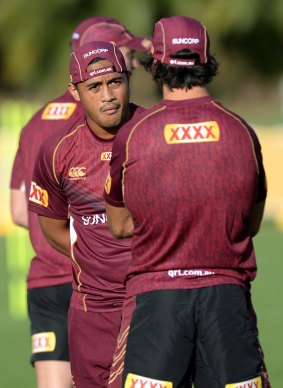 Master and apprentice: Anthony Milford talks to Johnathan Thurston at Queensland training.