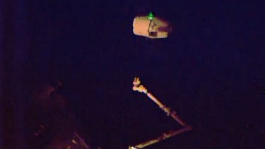 The SpaceX unmanned Dragon supply ship released and beginning its departure from the International Space station.
