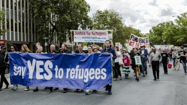 Supporters of refugees rally in Canberra.