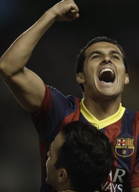 Chelsea signing Pedro Rodriguez celebrates a goal at Barcelona.