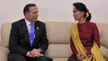 Rights concerns: Tony Abbott meets Myanmar opposition leader Aung San Suu Kyi.