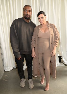 Kanye West and Kim Kardashian West attend  Kanye West Yeezy Season 2 during New York Fashion Week at Skylight Modern on September 16, 2015 in New York City.