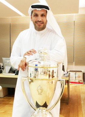 Prized possession: Khaldoon Al Mubarak with the FFA Cup trophy.