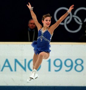 Tara Lipinski, then 15, jumps during her performance in the final of the Olympic women's free skating in 1998. Twenty years later, she is calling for the sport to change its name.