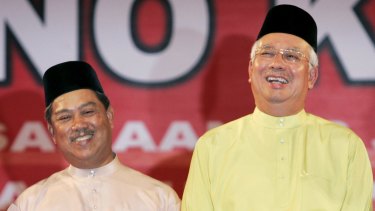 Malaysian Prime Minister Najib Razak (right) axed his deputy Muhyiddin Yassin (left).  