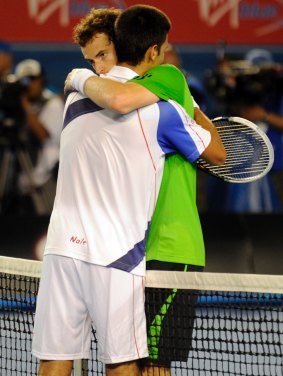 Novak Djokovic and Andy Murray embrace after the men's final in 2011.