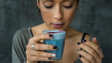 Yep, it's blue: Matcha Mylkbar co-owner Zoe Annabel with a blue algae latte.
