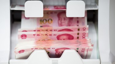 Banks and other financial institutions in China will have to report all domestic and overseas cash transactions larger than 50,000 yuan ($9984), compared with 200,000 yuan previously, the central bank said on Friday.