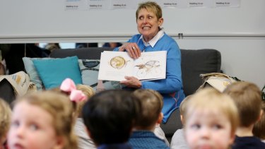 Pure heaven: author Mem Fox reads Possum Magic to the children at the Capital Hill Early Childhood Centre in Canberra.
