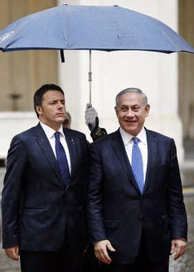 Heavy weather: Israeli Prime Minister Benjamin Netanyahu (right) arrives at the Palazzo Chigi in Rome for his meeting with Italian counterpart Matteo Renzi (left).