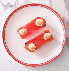 Compressed watermelon dressed with mojama and almond.
