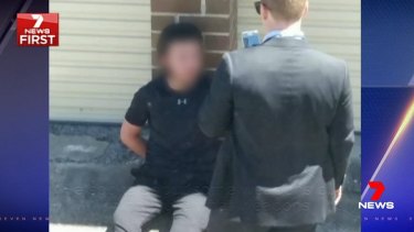 The 16-year-old, who cannot be identified for legal reasons, was arrested along with a friend, also 16, in a dramatic operation in Bankstown on Wednesday afternoon. 
