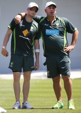 Together as one: Australian skipper Steven Smith and coach Darren Lehmann at training on Sunday.