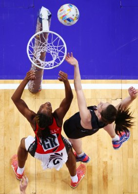 View from above: Silver Ferns goal shooter  Bailey Mes competes with Kielle Connelly in Sydney on Saturday.