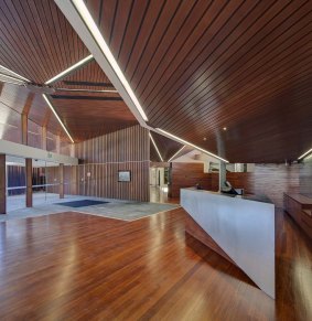 The interior features red gum, recycled timber and steel.