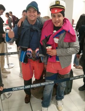 Baggage tactics: Two travellers who wore layers of their clothing in the air to avoid excess baggage costs.
