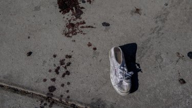 Blood and a lost shoe down the street from the Mandalay Bay Resort and Casino, in Las Vegas.