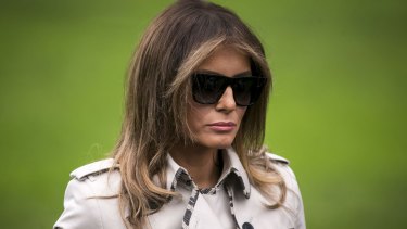 Melania Trump listens in as President Donald Trump speaks to the media at the White House in October last year.