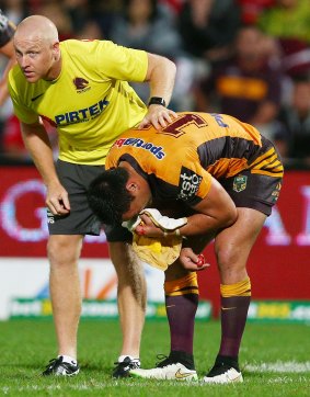 Alex Glenn of the Broncos leaves the field with a fractured eye socket.