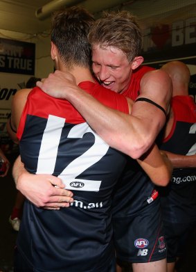 Elated: Dom Tyson and Sam Frost celebrate.