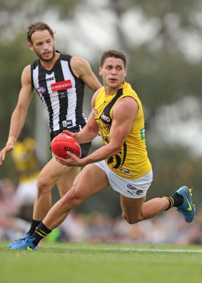 Dion Prestia finds some space during the pre-season match against Collingwood at Ted Summerton Reserve.