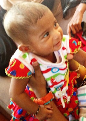 An asylum seeker baby whose parents have been told they will be sent to Nauru.