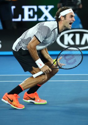 The moment he won: Roger Federer celebrates championship point.