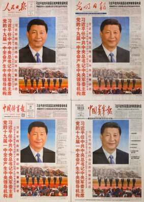 Copies of official Communist Party newspapers' front pages from left clock wise Renmin Ribao, Guangming Ribao, China Sport Daily and China Youth Daily.