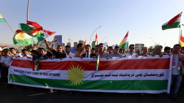 Calls for independence: Iraqi Kurdish demonstrators outside UN offices in Erbil on August 23, 2014. 