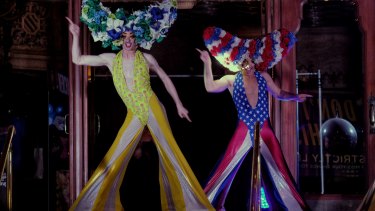 Cast members from Priscilla Queen of the Desert perform on the steps of the Regent Theatre as part of White NIght.