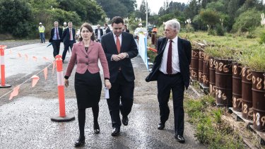 Premier Gladys Berejiklian (left), WestConnex Minister Stuart Ayres and Sydney Motorway Corporation chief executive Dennis Cliche early this month.