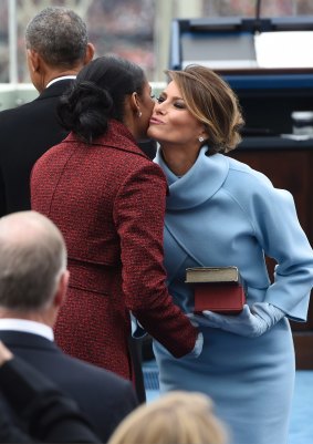 Melania Trump kisses Michelle Obama on Capitol Hill in Washington on President Donald Trump's Inauguration Day.