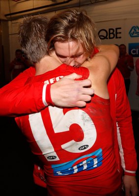 Kieren Jack hugs brother Brandon after game.