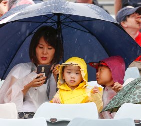 Rain did not dampen the spirit of an enthusiastic crowd during last month's Asian Cup.

Canberra Times photo by Matt Bedford