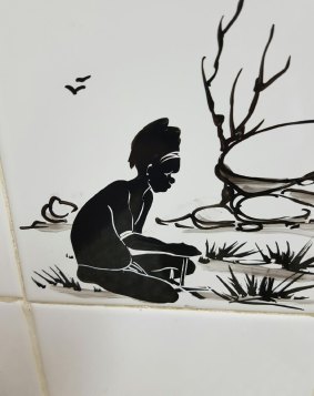 One of the tiles beside the men's urinal in the Sussex Inlet RSL that has upset ACT Labor's Bec Cody.