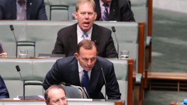 Mr Abbott taking his place on the backbench during question time on Tuesday.