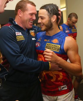 James Aish and Lions coach Justin Leppitsch.