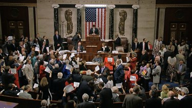 Rebellious Democrats stage an extraordinary all-day sit-in on the floor of the US Congress to demand votes on gun-control bills.