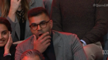 Tarang Chawla puts his hand over his mouth as Steve Price speaks to Van Badham on Q&A.