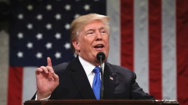 President Donald Trump delivers his first State of the Union address in the House chamber of the Capitol building