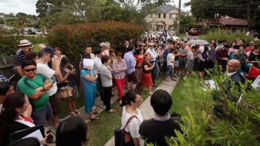 A crowd of mainly Chinese buyers at a hot auction in Sydney.