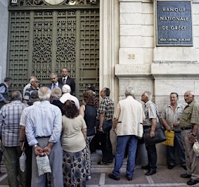 Pensioners line up outside a bank in Athens.