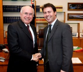 With his then employer, prime minister John Howard, in Canberra in 2004.