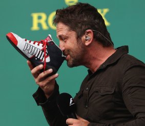  Actor Gerard Butler even did a shoey on the podium with Daniel Ricciardo in the US.