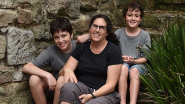 Robyn Bernstein, with her sons Ed and Kai Hall, questions why Special Religious Education should be held in class time.