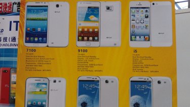 A poster at the China Information Technology Expo advertising fake phones. Top left is a Samsung Galaxy Note II knock-off, while top right is an iPhone 5 fake. In the bottom row are two Galaxy S3 knock-offs.