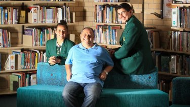 David Ghattas with his daughter, Stephanie and son, Sarkis at Merrylands High School, in Sydney's west. 