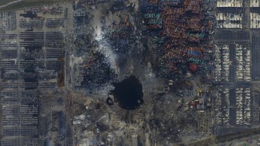 An aerial picture shows the crater at the blast site in Binhai new district, Tianjin.